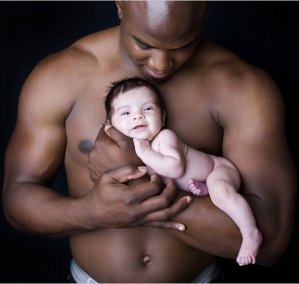 DeMarcus Ware, Dallas Cowboy Linebacker adopted a white baby girl.